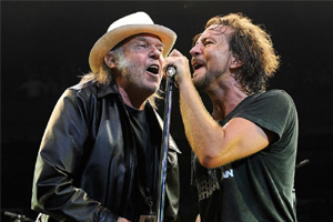 Neil Young Rocks the Sports Arena with Pearl Jam Photo
